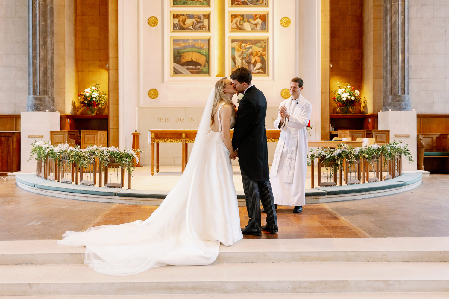A bride and groom kiss at their Islington wedding