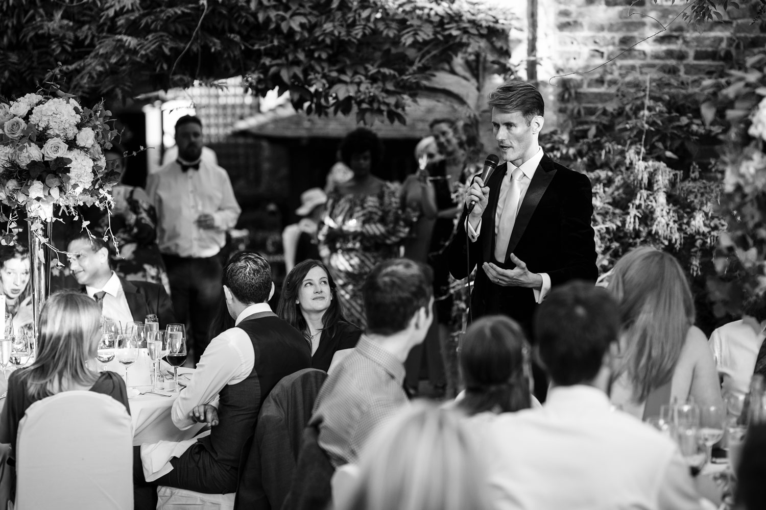 A groom gives his speech at the Roof Gardens in Kensington - London wedding photographer