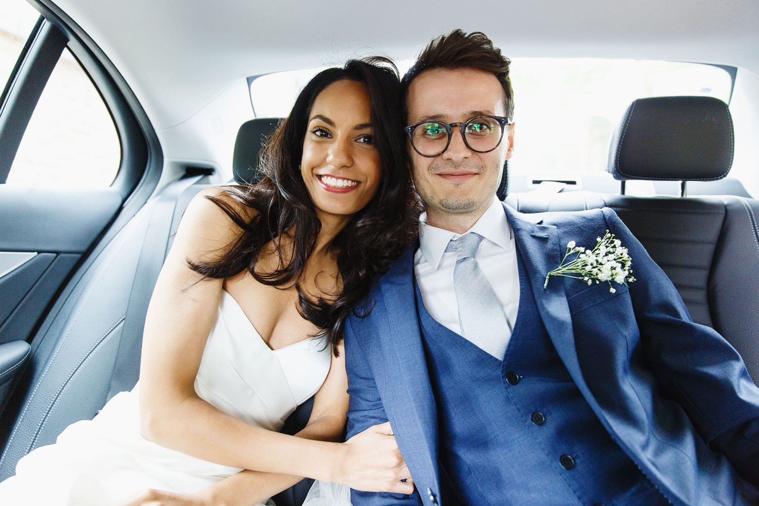 A gorgeous bride and groom travel to their wedding recetipn - wedding photography pricing